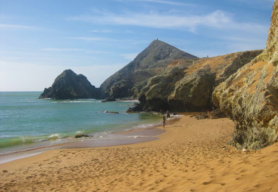 A sandy beach at the base of Cerro Pan de Azucar, Cabo de la Vela