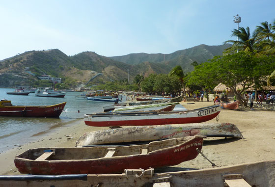 Taganga's beach lined with fishing boats